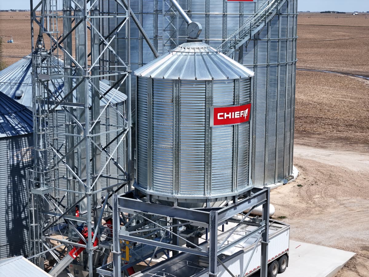 grain hopper with truck ready for loading A Chief grain hopper with a truck ready for loading.