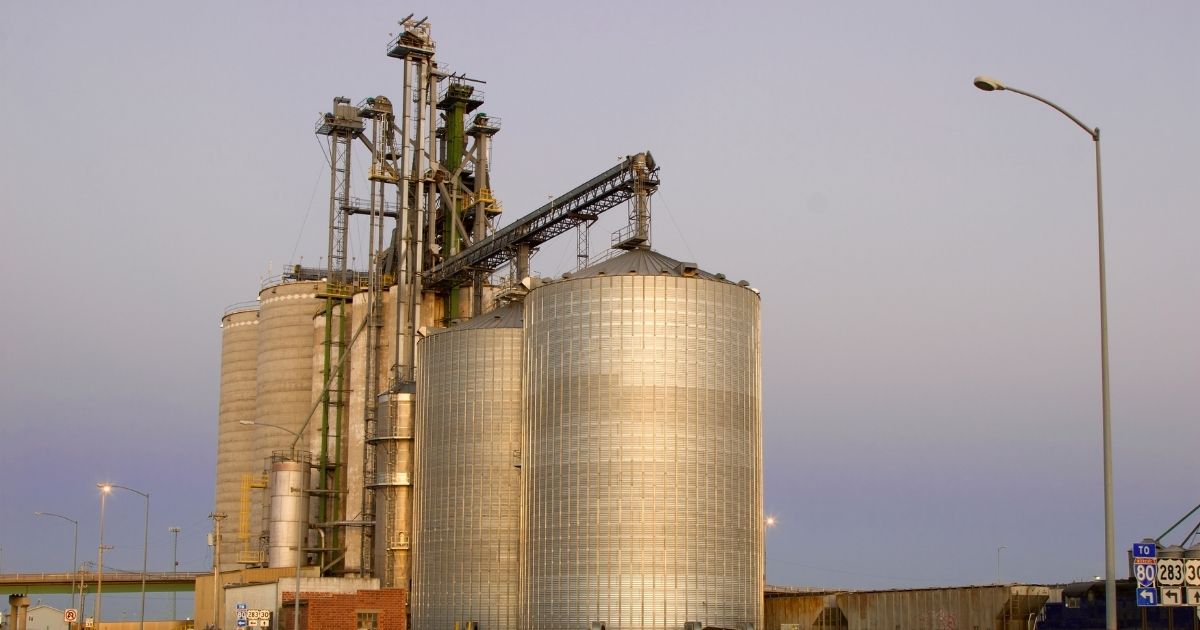 A grain storage system with grain bins and a grain elevator system.