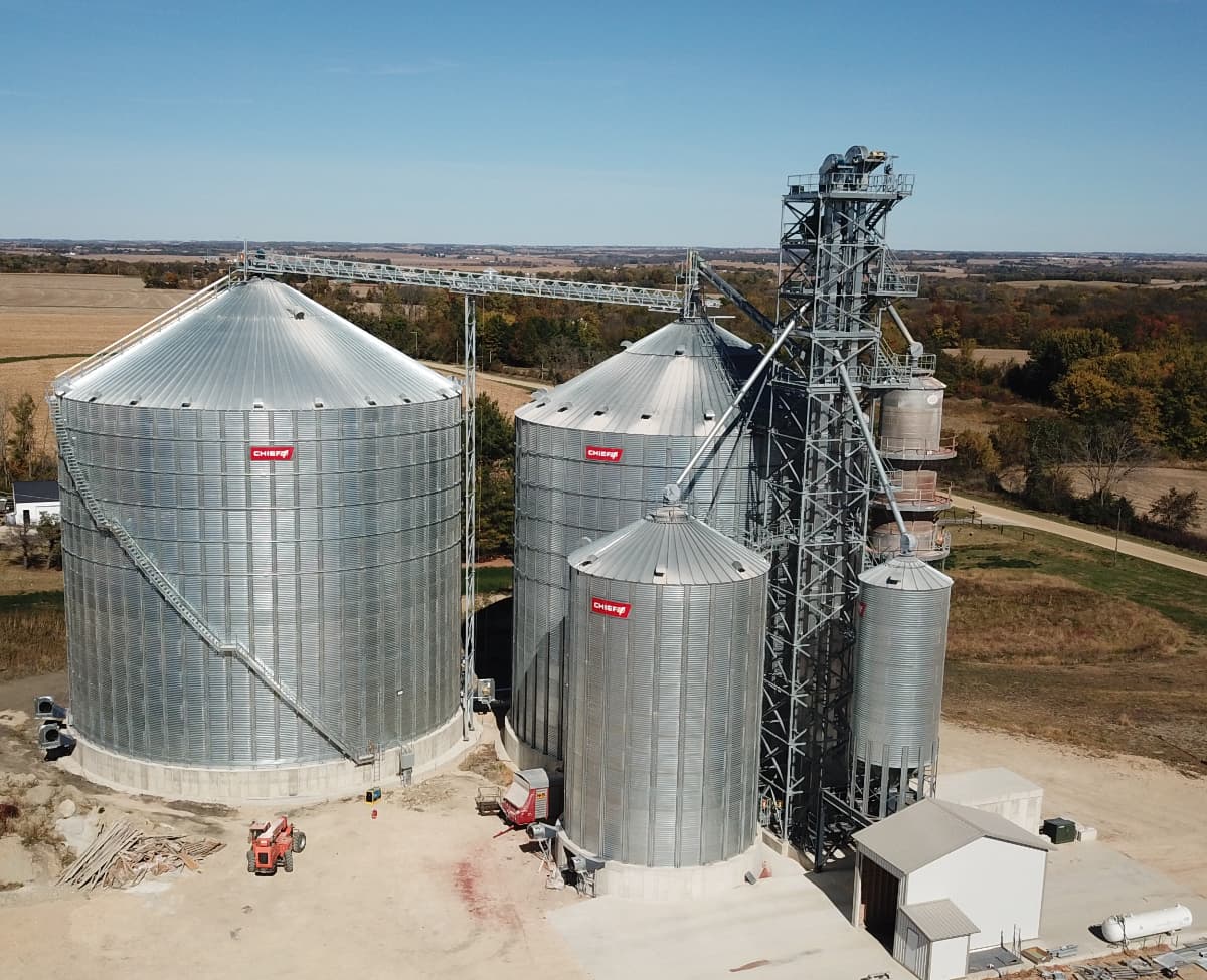 A Chief Agri grain storage system with different sized grain bins.