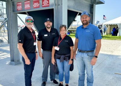 Chief Agri employees visiting The All American Farm lot during Husker Harvest Days 2025.