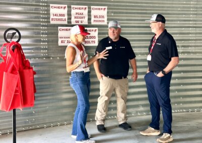 Chief Agri employees visiting The All American Farm lot during Husker Harvest Days 2025.