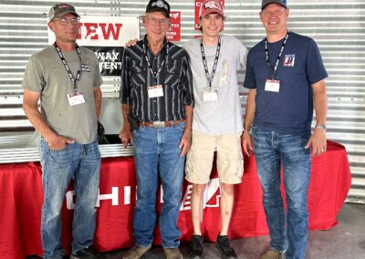Chief Agri employee and family visiting The All American Farm at Husker Harvest Days 2025.