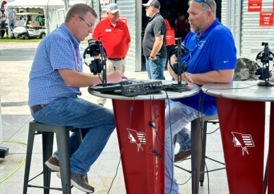 Dealer interview with KRVN radio taking place at The All American Farm during Husker Harvest Days 2025.