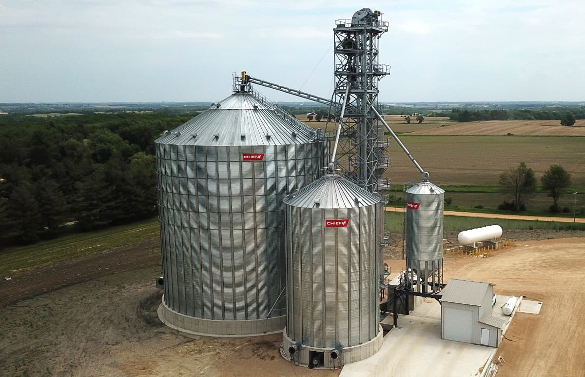 A complete Chief Agri grain storage system with different sizes of bins.